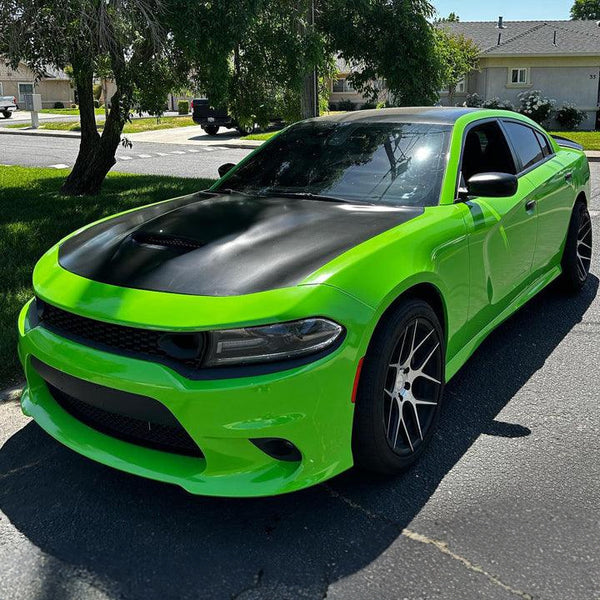 Gloss Grass Green Vinyl Car Wrap applied to vehicle, featuring vibrant green color with a smooth high-gloss finish and reflective surface