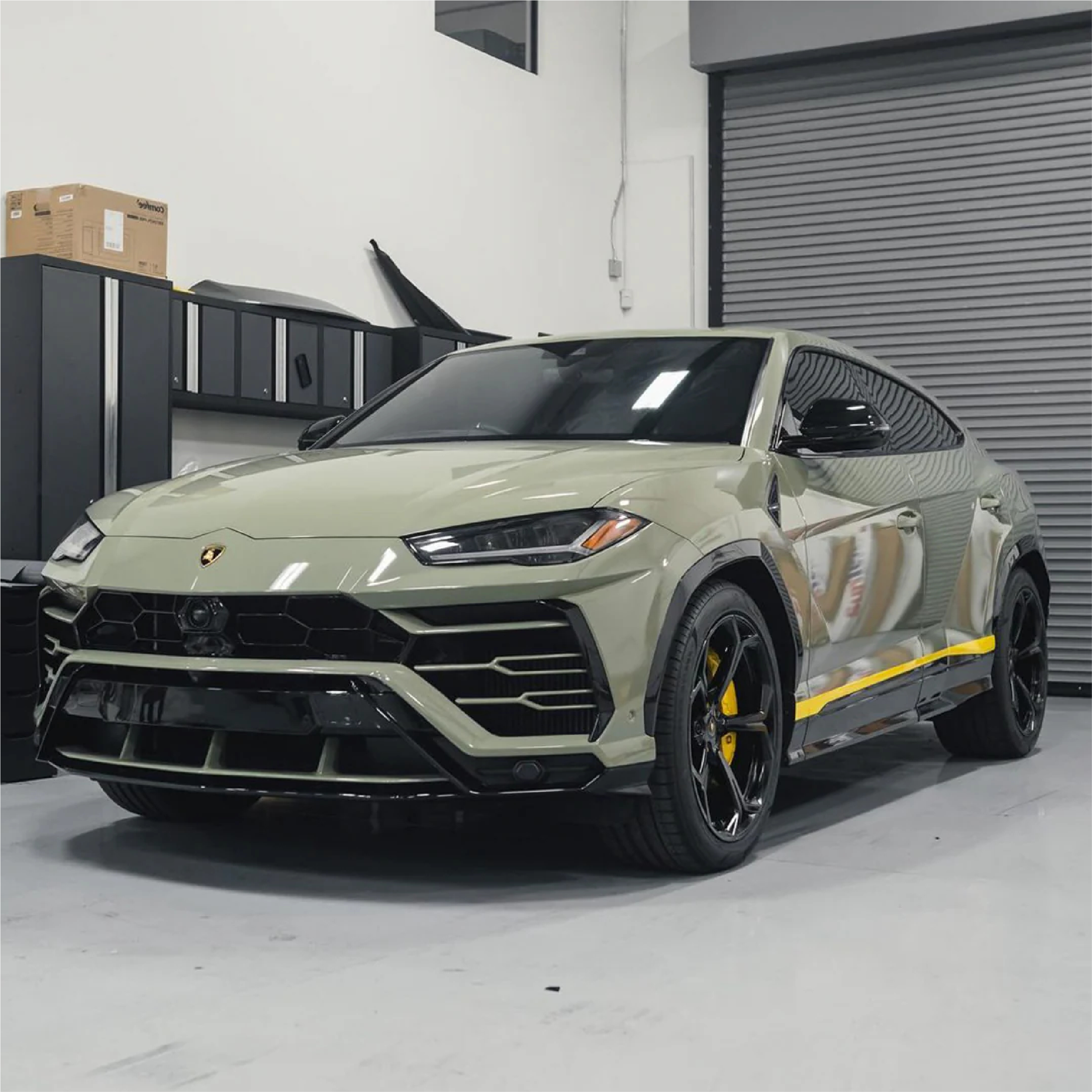 Gloss Khaki Green Vinyl Car Wrap with rich green tone and reflective finish, shown partially unrolled for vehicle wrapping application.