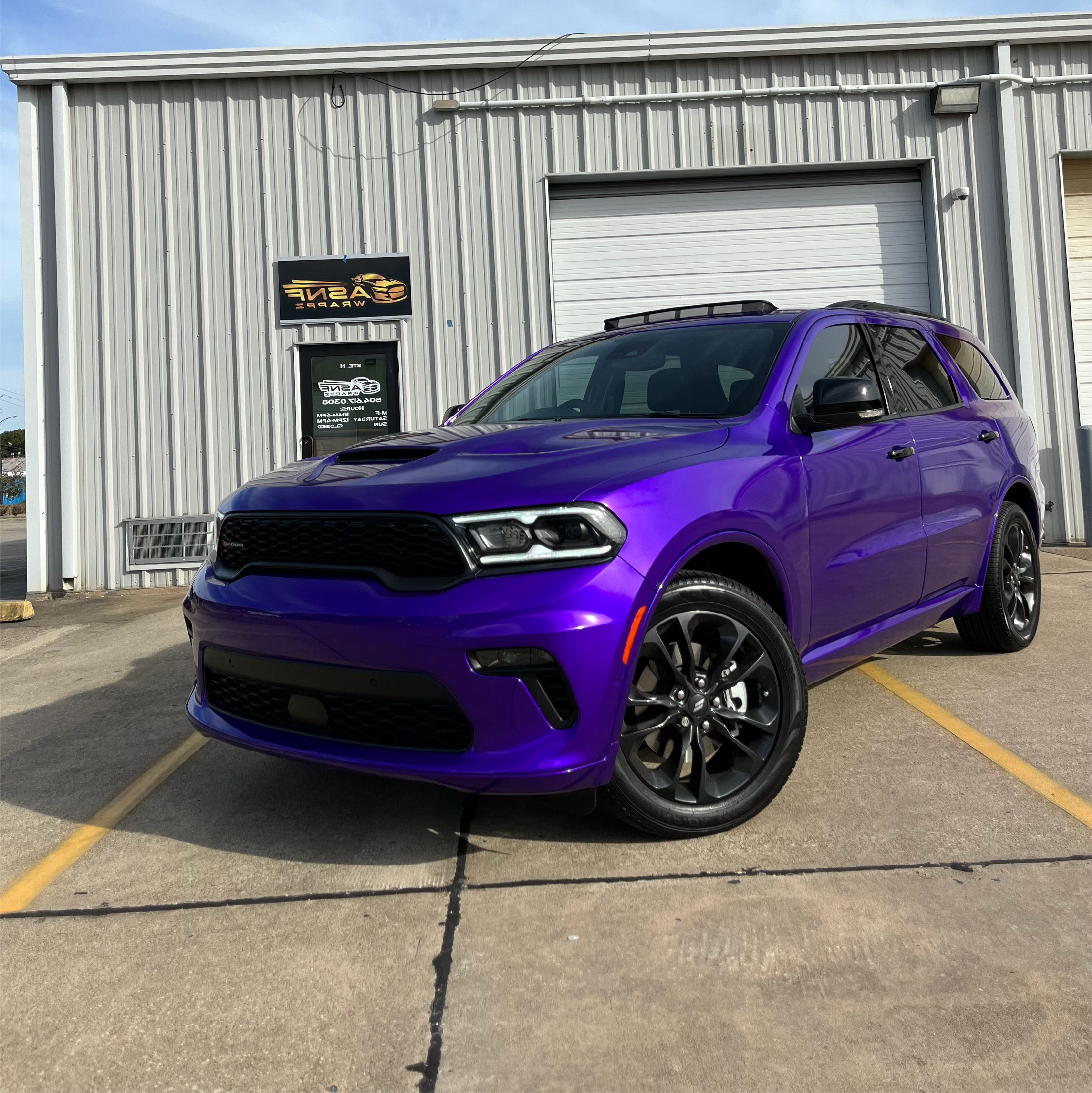 Gloss Passion Purple Vinyl Car Wrap applied to vehicle, highlighting vibrant purple color with a smooth high-gloss finish and reflective surface