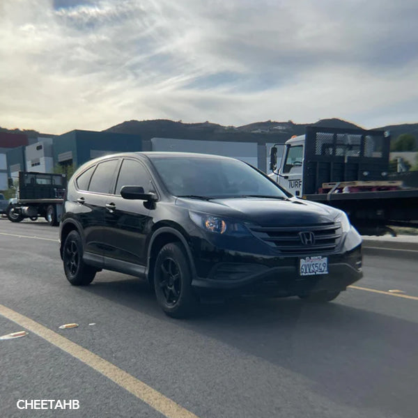 Gloss Black Vinyl Car Wrap applied to vehicle, showcasing deep black color with a smooth high-gloss finish and mirror-like reflective surface