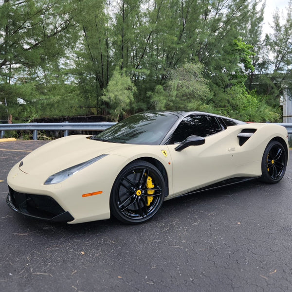Matte Sandstorm Vinyl Car Wrap in a smooth beige finish, shown partially unrolled with soft, non-reflective texture for vehicle wrapping.