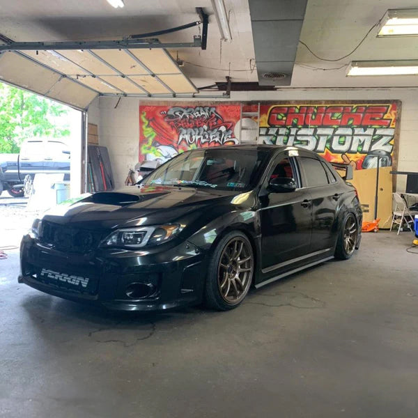 Gloss Black Metallic Vinyl Car Wrap applied to vehicle, showcasing deep black color with metallic flake and a smooth high-gloss reflective finish