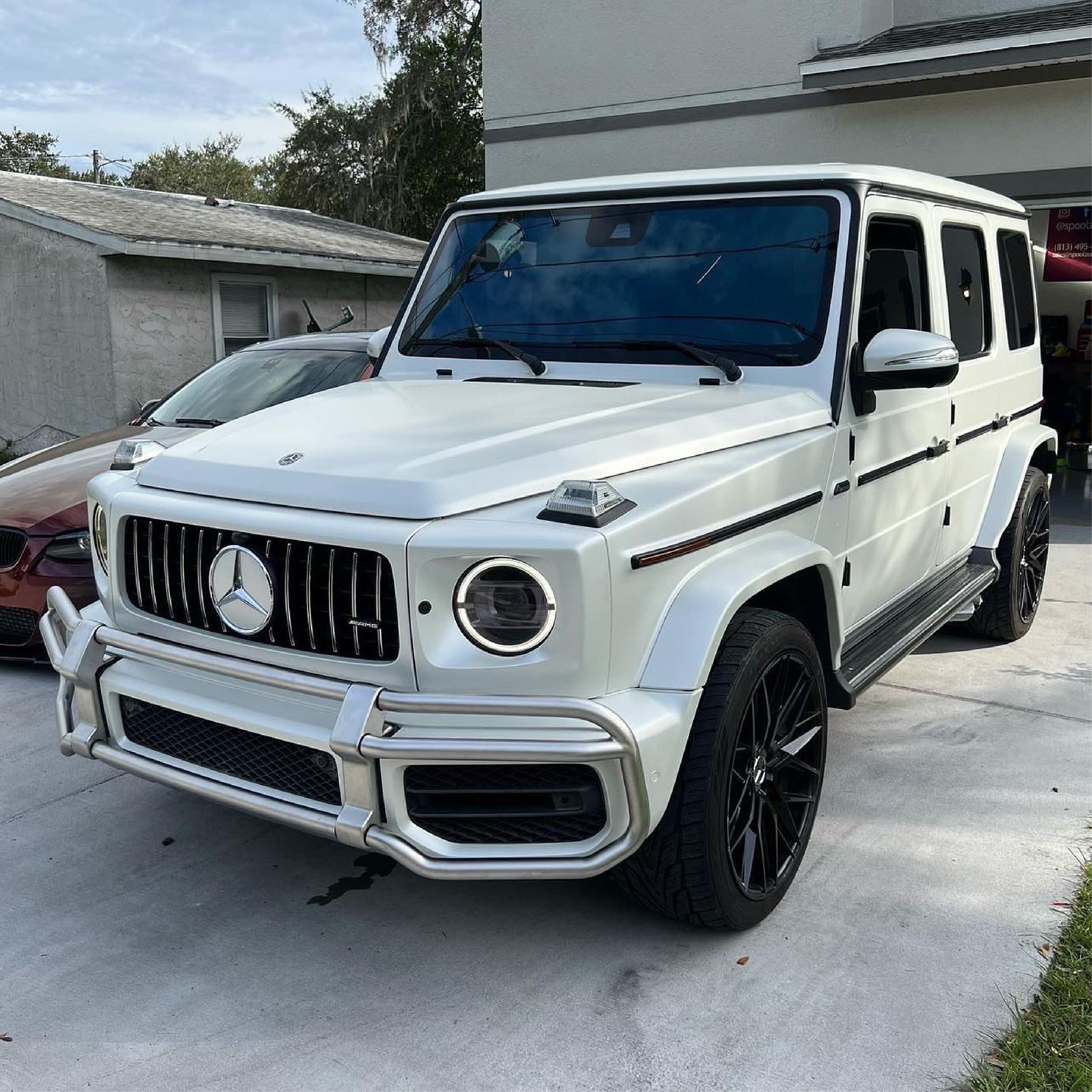 Satin Pearl White Vinyl Car Wrap applied to vehicle, showcasing smooth satin finish with subtle pearlescent shimmer and clean white tone