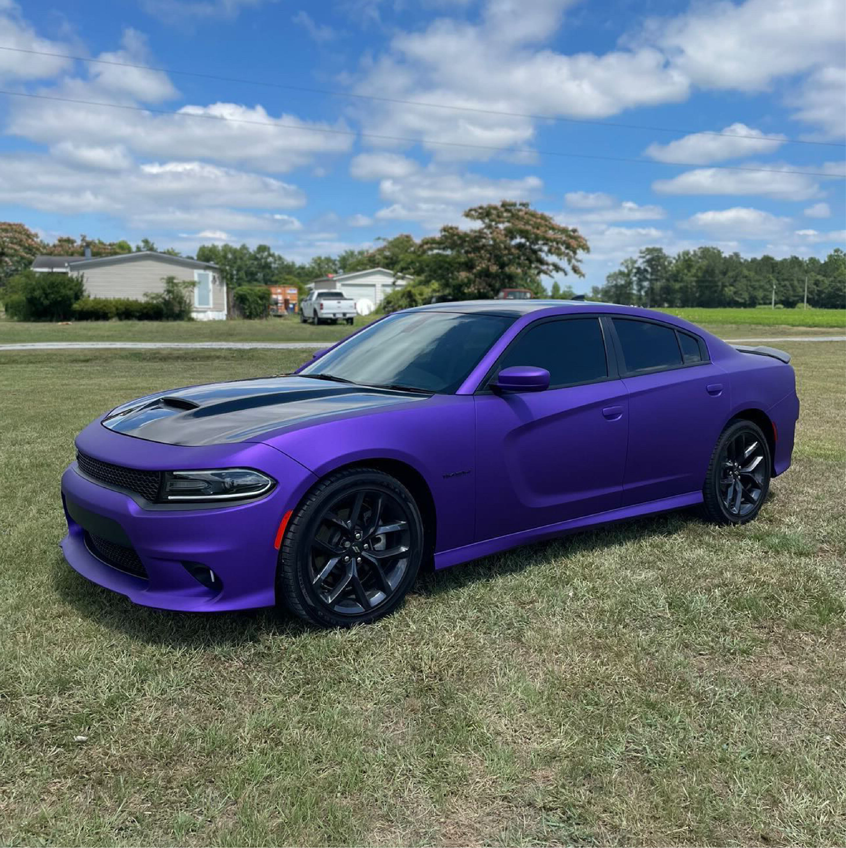 Satin Passion Purple Aluminum Vinyl Car Wrap applied to vehicle, showcasing vibrant purple color with smooth satin finish and metallic aluminum texture