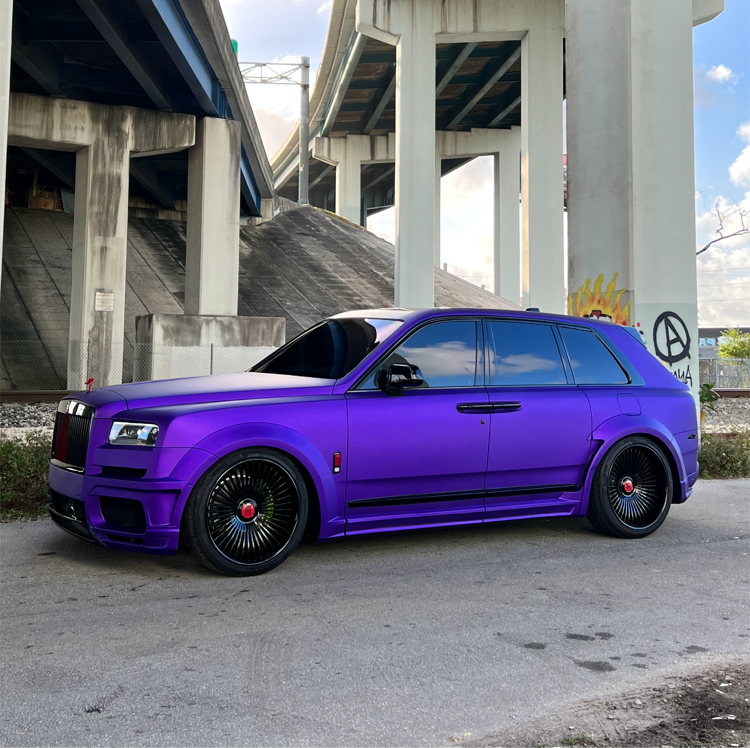 Satin Passion Purple Aluminum Vinyl Car Wrap applied to vehicle, showcasing vibrant purple color with smooth satin finish and metallic aluminum texture