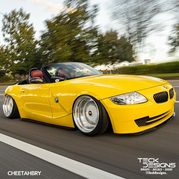 Gloss Bright Yellow Vinyl Car Wrap applied to vehicle, showcasing bold yellow color with a smooth high-gloss finish and reflective surface
