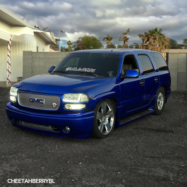 Gloss Berry Blue Vinyl Car Wrap with vibrant blue color and reflective high-gloss finish, shown partially unrolled for vehicle application.