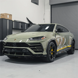 Gloss Khaki Green Vinyl Car Wrap with rich green tone and reflective finish, shown partially unrolled for vehicle wrapping application.  

