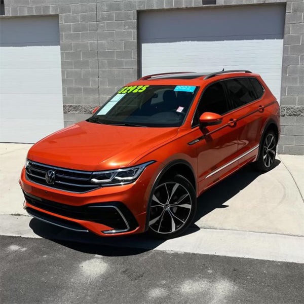 Gloss Lava Orange Metallic Vinyl Car Wrap - High-quality automotive vinyl wrap with a glossy, metallic orange finish, perfect for vehicle customization and exterior detailing