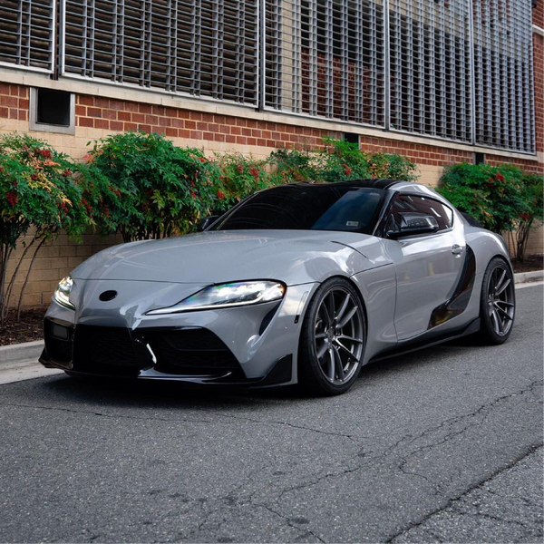 Gloss Nardo Gray Vinyl Car Wrap applied to vehicle, highlighting smooth high-gloss finish and signature Nardo gray color with reflective shine