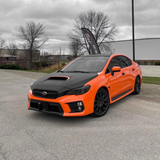 Gloss Orange Vinyl Car Wrap applied to vehicle, showcasing vibrant orange color with a smooth high-gloss finish and reflective surface