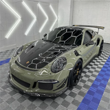 Gloss Khaki Green Vinyl Car Wrap with rich green tone and reflective finish, shown partially unrolled for vehicle wrapping application.  
