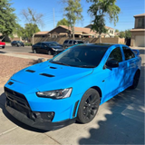 Gloss Light Blue Vinyl Car Wrap applied to vehicle, showcasing soft sky-blue color with a smooth high-gloss finish and reflective surface