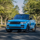 Gloss Light Blue Vinyl Car Wrap applied to vehicle, showcasing soft sky-blue color with a smooth high-gloss finish and reflective surface