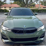 Gloss Military Green Vinyl Car Wrap applied to vehicle, showcasing rich army green color with a smooth, high-gloss finish and reflective surface