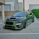 Gloss Military Green Vinyl Car Wrap applied to vehicle, showcasing rich army green color with a smooth, high-gloss finish and reflective surface