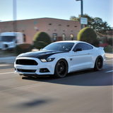 Gloss White Vinyl Car Wrap applied to vehicle, showcasing clean white color with a smooth high-gloss finish and reflective surface