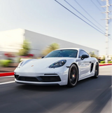 Gloss White Vinyl Car Wrap applied to vehicle, showcasing clean white color with a smooth high-gloss finish and reflective surface