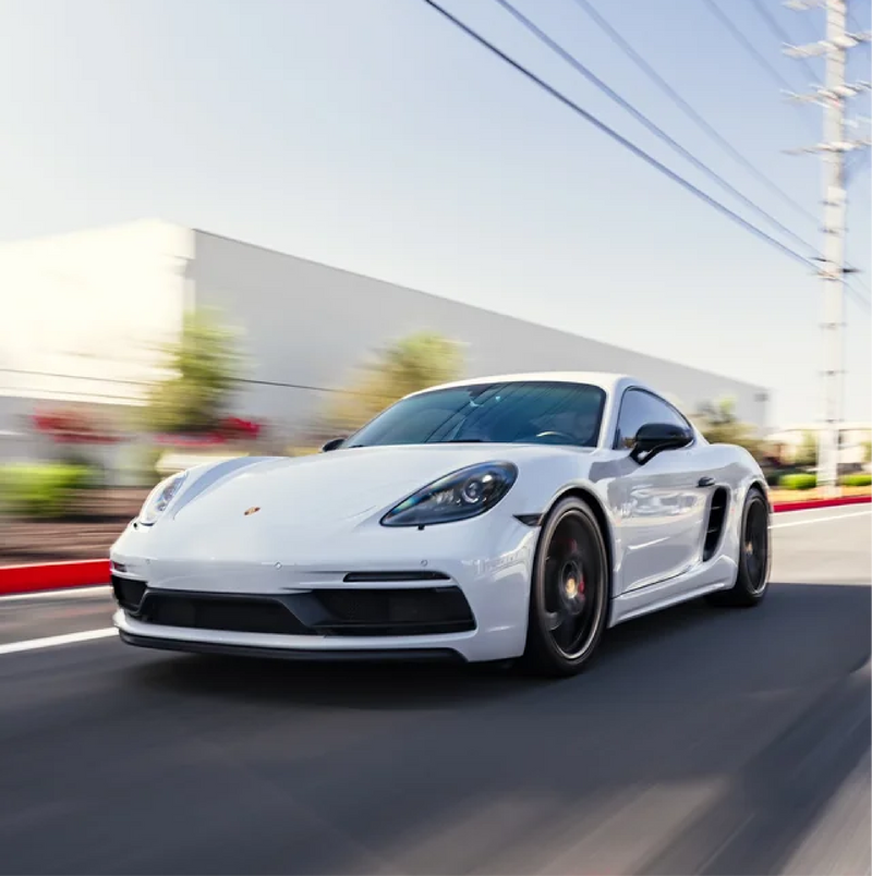 Gloss White Vinyl Car Wrap applied to vehicle, showcasing clean white color with a smooth high-gloss finish and reflective surface