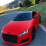 Matte Carmine Red Vinyl Car Wrap applied to vehicle, showcasing deep red color with smooth matte finish and bold, non-reflective appearance