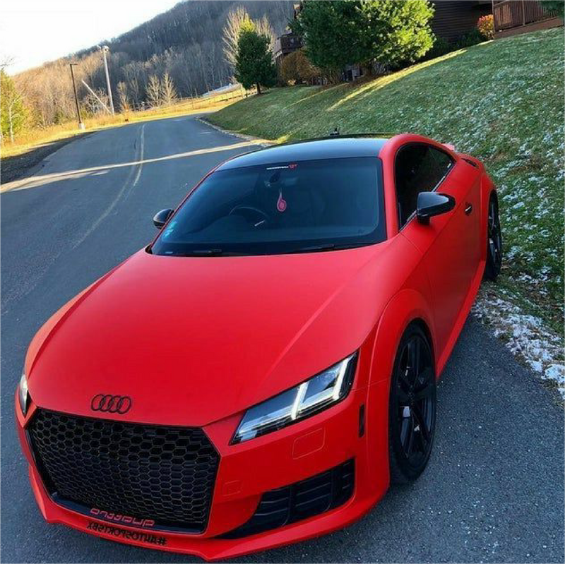 Matte Carmine Red Vinyl Car Wrap applied to vehicle, showcasing deep red color with smooth matte finish and bold, non-reflective appearance