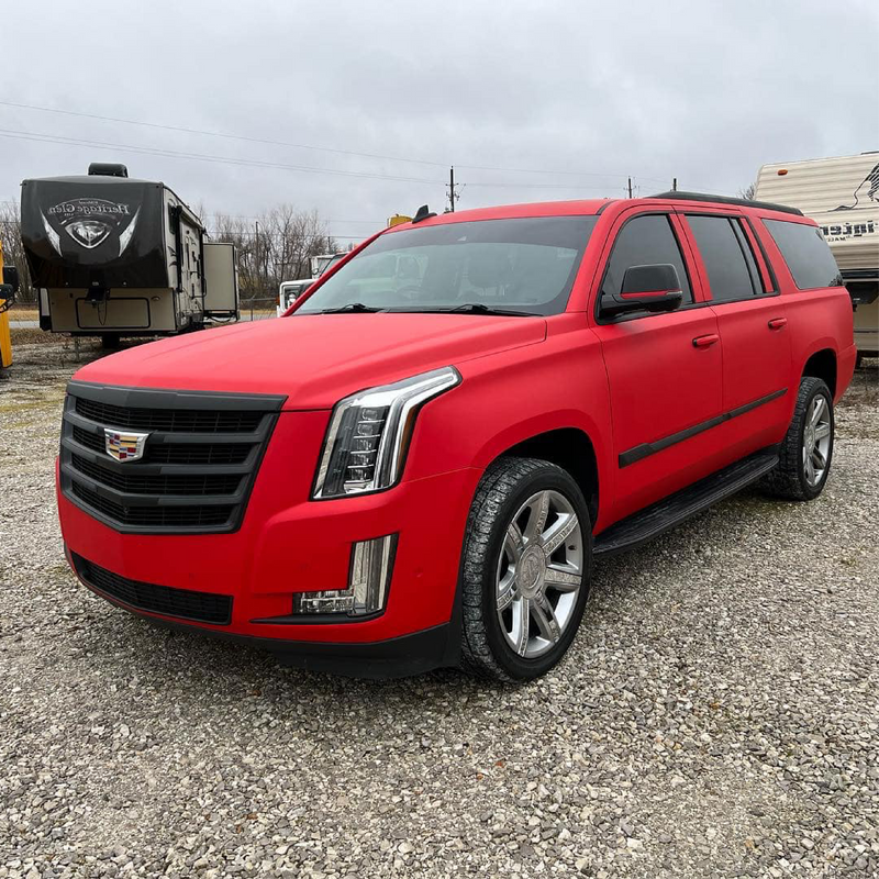 Matte Carmine Red Vinyl Car Wrap applied to vehicle, showcasing deep red color with smooth matte finish and bold, non-reflective appearance
