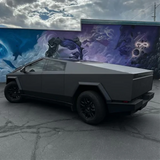 Matte Charcoal Metallic Vinyl Car Wrap applied to vehicle, showcasing dark gray tone with smooth matte finish and subtle metallic texture