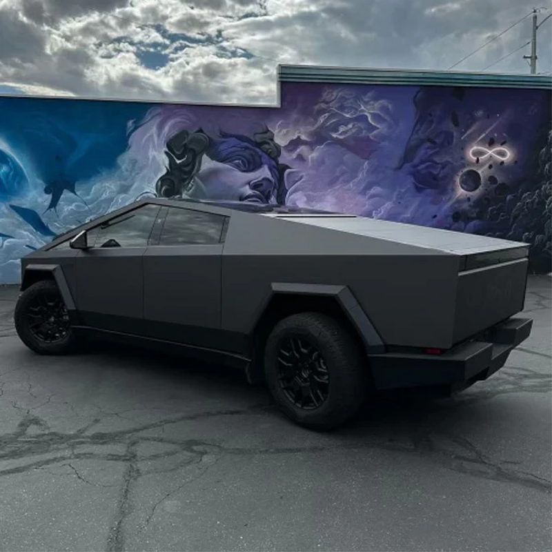 Matte Charcoal Metallic Vinyl Car Wrap applied to vehicle, showcasing dark gray tone with smooth matte finish and subtle metallic texture