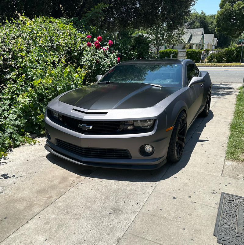 Matte Charcoal Metallic Vinyl Car Wrap applied to vehicle, showcasing dark gray tone with smooth matte finish and subtle metallic texture