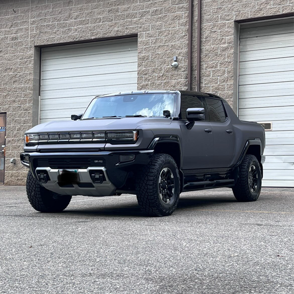 Matte Charcoal Metallic Vinyl Car Wrap applied to vehicle, showcasing dark gray tone with smooth matte finish and subtle metallic texture