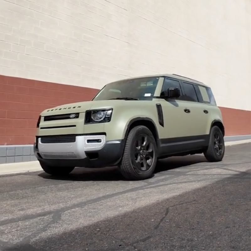 Matte Khaki Green Vinyl Car Wrap with non-reflective military green finish, shown partially unrolled for vehicle wrap application.  
