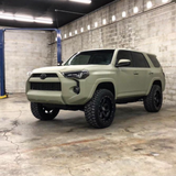 Matte Khaki Green Vinyl Car Wrap with non-reflective military green finish, shown partially unrolled for vehicle wrap application.  
