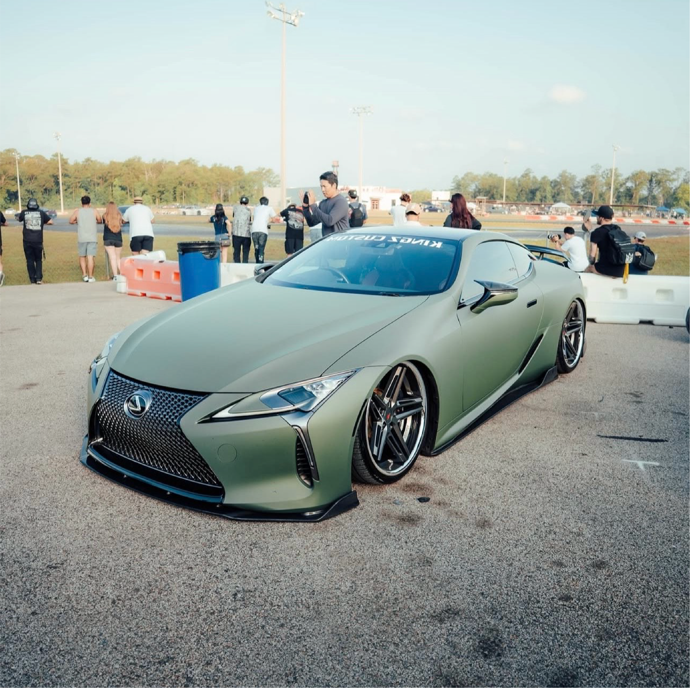 Matte Military Green Vinyl Car Wrap applied to vehicle, featuring a deep tactical green color with smooth matte finish and rugged, non-reflective appearance