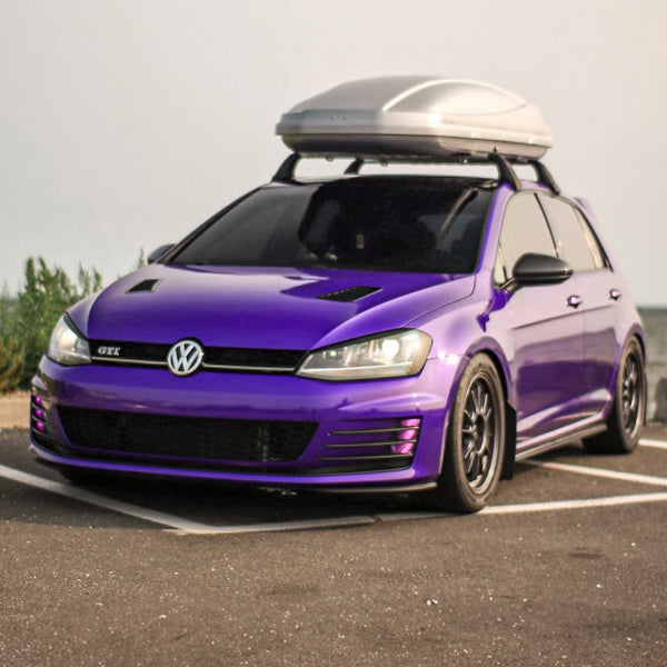 Gloss Passion Purple Vinyl Car Wrap applied to vehicle, highlighting vibrant purple color with a smooth high-gloss finish and reflective surface