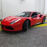 Gloss Carmine Red Vinyl Car Wrap applied to vehicle, showcasing bold carmine red color with a smooth high-gloss finish and reflective surface
