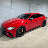 Gloss Carmine Red Vinyl Car Wrap applied to vehicle, showcasing bold carmine red color with a smooth high-gloss finish and reflective surface