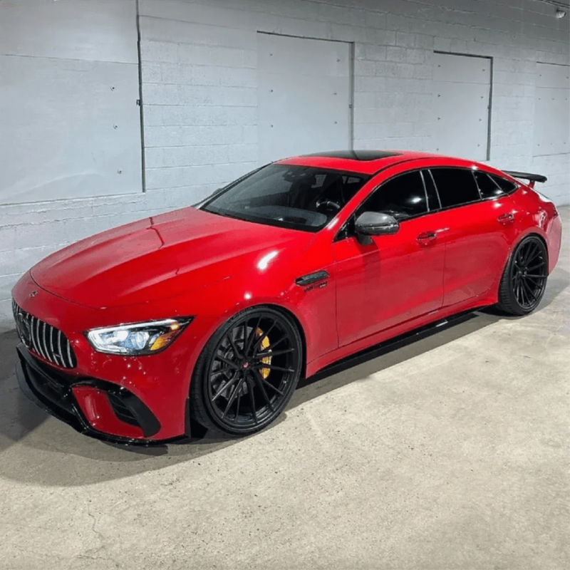 Gloss Carmine Red Vinyl Car Wrap applied to vehicle, showcasing bold carmine red color with a smooth high-gloss finish and reflective surface