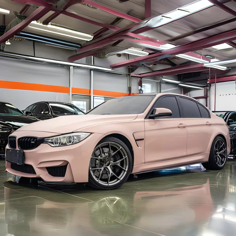 Perfect peach BMW car in a garage with industrial lighting