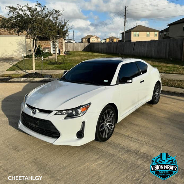 Gloss Light Gray Vinyl Car Wrap applied to vehicle, showing smooth high-gloss finish and clean light gray color with reflective surface