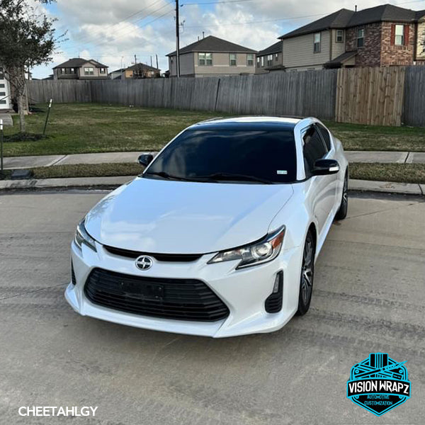 Gloss Light Gray Vinyl Car Wrap applied to vehicle, showing smooth high-gloss finish and clean light gray color with reflective surface